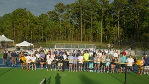 Briarwood players, parents, coaches, school adminstrators and supporters gathered at the high school for the ribbon cutting on the new tennis courts at the school on Sept. 24. (Contributed)