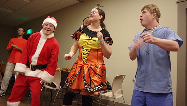 Members of the Alabaster and Hoover therapeutic recreation programs dance during a Halloween event hosted at the Alabaster Senior Center on Oct. 29. (Reporter Photo/Neal Wagner)