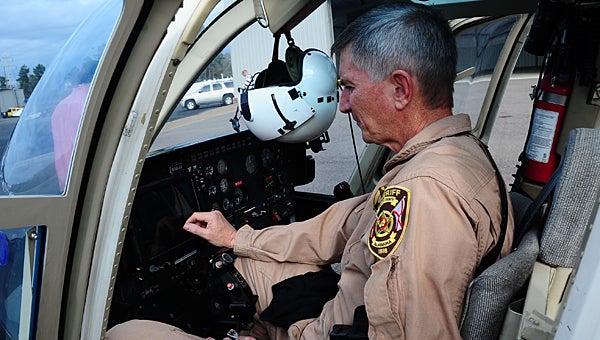 Shelby County Sheriff’s Office Lt. Dennis Blackerby prepares to take off from the Shelby County Airport in the office’s newly acquired TH-67 Creek helicopter on Dec. 16. (Reporter Photo/Neal Wagner)