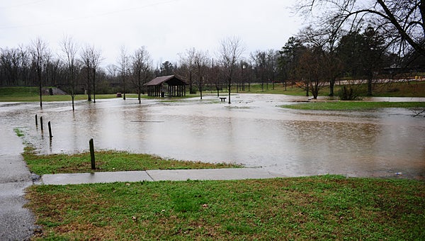 Water covers portions of Warrior Park in Alabaster on Dec. 28 after several days of heavy rainfall. No property damage was reported in Shelby County’s largest cities. (Reporter Photo/Neal Wagner)