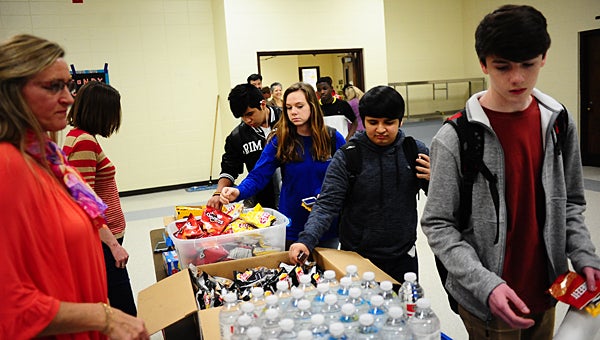 Thompson High School students who earned perfect attendance during the fall semester enjoy a party hosted by the school’s PTO on Jan. 29. (Reporter Photo/Neal Wagner)